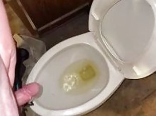 Grown man pissing after along day at work