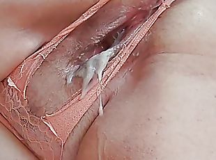 close-up filling a fat woman&#039;s big pussy with cum