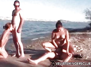 Velvet Swingers Club couples fucking on the beach
