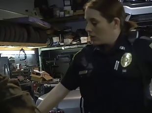 Two white police whores ride a big black cock in a chop shop