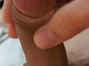 Twink masturbating in bed, close-up freshly shaved balls