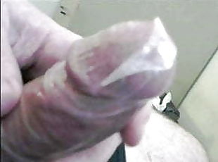 Over the edge cum in condom