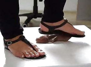 Flat sandals cock trampling on cockbox