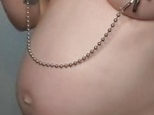 Pregnant slut fingers self with nipple clamps