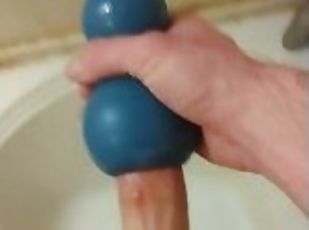 Stroking hard cock with cumshot