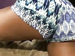 shaking ass over bed in booty shorts