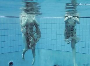 Two hot hairy beauties underwater