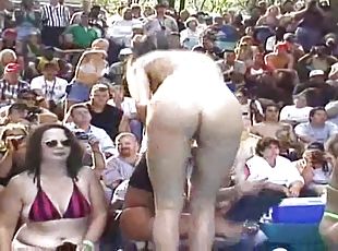 My naked horny wife is fully naked in the public show