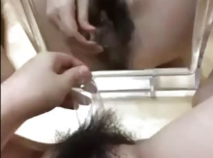 Hairy Asian cunt crammed with objects