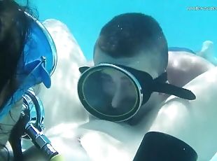 Eating pussy underwater with a scuba diving girl