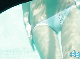 Underwater with a teen in a sexy white bikini