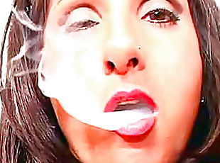 Pierced clitoris brunette girl smokes cigarettes
