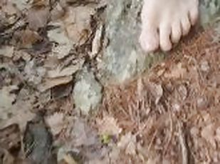 Barefoot walk through the woods. Solo male feet preview