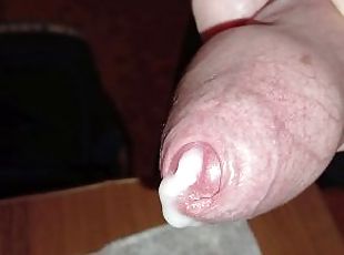 An excited big cock in close-up really wants to cum. Milky thick cum