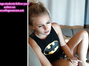 Batgirl strips fingers & sucks dick on cam