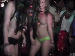 Topless girls shake their asses at Mardi Gras