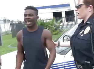 Muscular black stud with a huge cock fucking female cops hard!