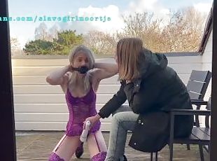 Gagged Slave girl get teased in the cold on the balcony